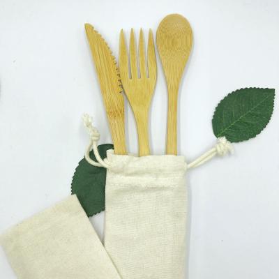 China Amazon Hit Eco Friendly Disposable Travel Reusable Wooden Kids Bamboo Cutlery Set With Clothbag for sale