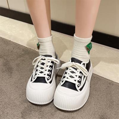 China Breathable Sneakers Women Sports Casual Sneakers Shoes Spring Canvas Lace Up Thick Unique Flat Ladies Sneakers Vulcanized Shoes Woman White for sale