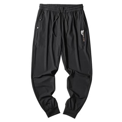 China Anti-wrinkle men's sweaty exercise pants men's jogging street wear pants men's casual pants men's nine points trousers for sale