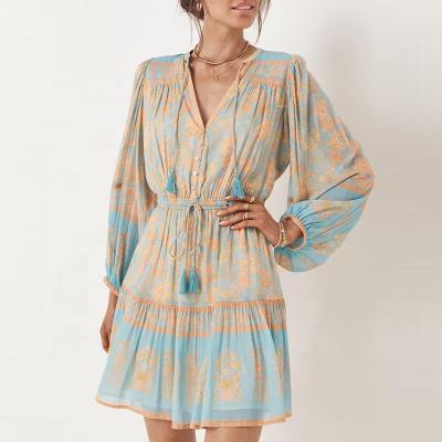 China Washable Women's Long Sleeve Floral Print V-Neck Bohemian Midi Tassel Retro Dresses for sale