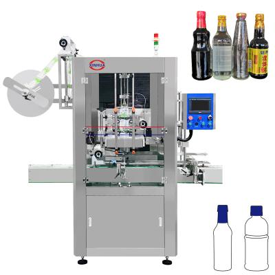 China HOT SALE Beverage Capsule Shrink Sleeve Automatic Labeling Machine Tamper Evident Tape Applicator for sale