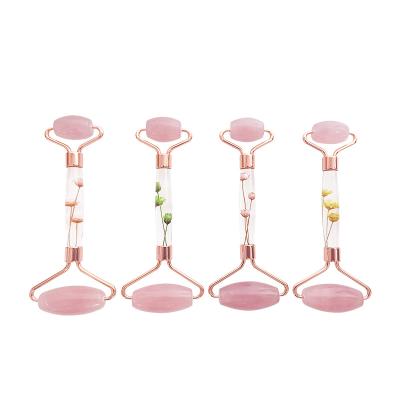 China Logo Flower Jade Roller Anti Aging Gua Sha Facial Massage Rose Quartz Jade Roller Handle Low Price Customized Portable for sale