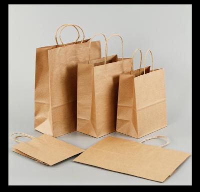 China Customized Eco-Friendly Logo Eco Recycle Strong Kraft Paper Bag Take Away Food Gift Packaging Flower Shopping Paper Bags With Handle for sale