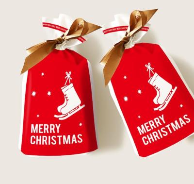 China Recyclable Custom Logo Cartoon Printed Christmas Gift Drawstring Candy Bags Strong Sealing for sale