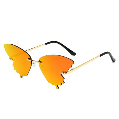 China 15 Years Experience 2021 New Arrival Rimless Girls Women Piece Sun Glasses Butterfly Shaped UV400 Sunglasses for sale