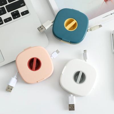 China Rotatable Cable Organizer New Square Multifunctional Earphone Cable Organizer for sale