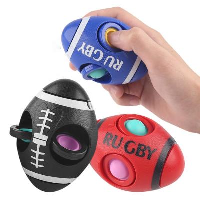 China Good Healthy Wholesale ABS Relaxation Toys Squeeze Children's Portable Rugby Busy Spinner for sale