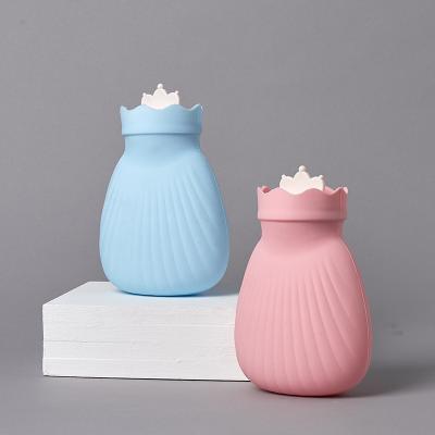 China Winter Warmer Mini Shell Silicone Hot Water Bottle Portable Non-slip Injection Custom Hand Water Color for sale