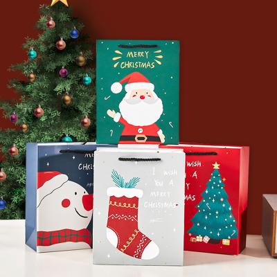 China The 16 Styles In Stock Christmas Series Hot Selling Snowman Aseptic Jars Christmas Tree Gift Paper Bag for sale