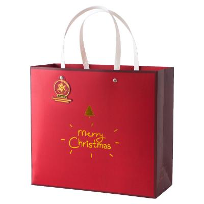 China Aseptic High Quality Red Green Logo Custom Luxury Shopping Paper Bag Christmas Gift Paper Bag Packaging Snowflake for sale