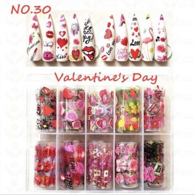 China Nail Art Decoration 10 Wholesale Box Buns/Valentines Day Nail Stickers Nail Foils With Famous Logo Popular Laser Luxury Nail Foil for sale