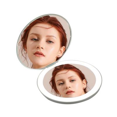 China Customized Large CLASSIC European Style Mini LED Hand Held Mirror Round Shape with White and Pink Shell Mirrors for sale