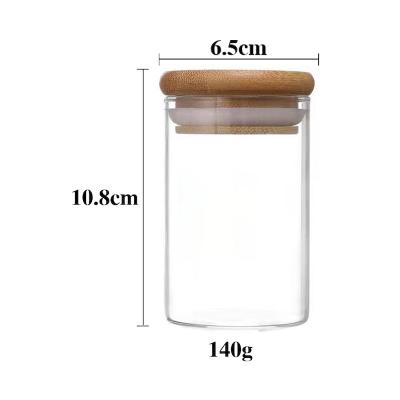 China Wholesale Custom Microwavable Glass Jar Stash 150ml Bamboo Lid 4 Sizes For Storage Tobacco And Spice for sale