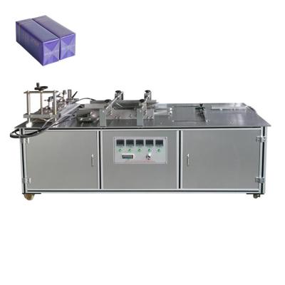 China Semi Automatic Food Perfume 3D Box Packing Manual Small Cellophane Wrapping Machine for sale