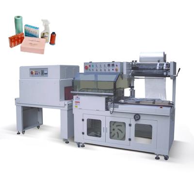 China Food Automatic L Type Bottle Shrink Wrap Machine Cling Film Heat Shrink Wrapping Machinery for sale