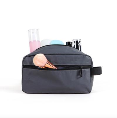 China Lightweight Waterproof Outdoor Waterproof Bag Black Makeup Pouch Tyvek Cosmetic Case Storage Bag For Travel for sale