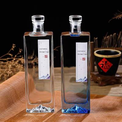 China Eco-friendly 500ml square shape unique vodka whiskey gin glass bottle with cork glass stopper for sale