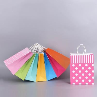 China Microwaveable custom made Color printing portable clothing package paper shopping bag for sale