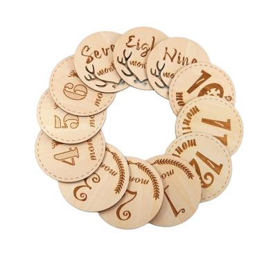 China Europe 2021 Hot Newborn Gift Idea Engraved Wooden Monthly Milestone Chips Baby Milestone Cards Party Props for sale