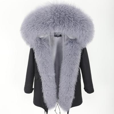 China Anti-wrinkle Winter Coats 2021 Women Luxurious Lamb Fur Parka Mongolia Sheep Fur Hooded Coat Outwear Fur Jacket for sale