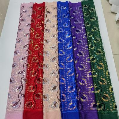 China New waterproof sequined net lace of yarn embroidery fabric factory leaf pattern for sale