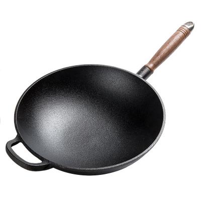 China Stron Cast Iron Cookware Wok Pan Sustainable Thai Stick Non Cooking Pan Cast Iron Wok Pan With Wooden Handle for sale