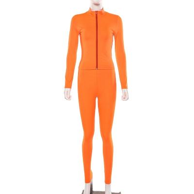 China New style anti-static fluorescent long sleeve yoga suit solid color zipper top sports suit for sale