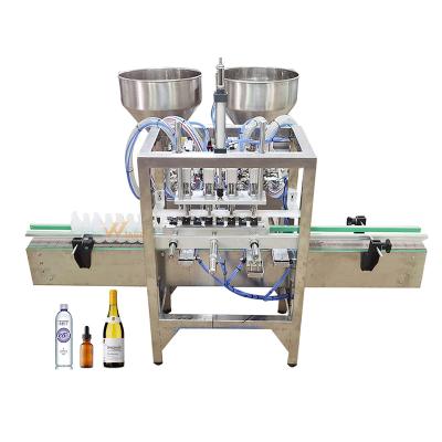 China Automatic Food Table Top Four Diving Nozzles Pump Magnetic Desktop Perfume Liquid Jar Vial Filling Machine With Chain Conveyor Belt for sale