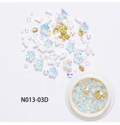 China Nail Art Beauty DIY 1 Pot Chunky Size Blue Green Pink Nail Art Decoration Resin Flower Rhinestone NR011 for sale