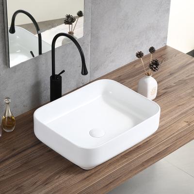 China Modern Design Rectangular Shape Table Top Ceramic Vanity Wash Basin For Bathroom for sale