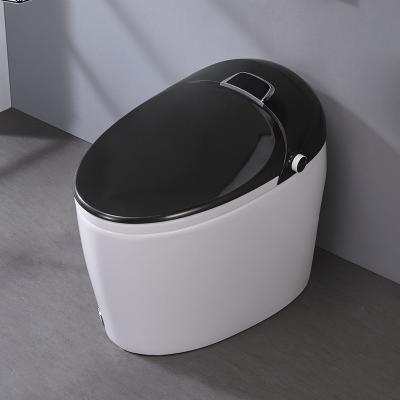 China Tankless One-Key Control Flow Sensor Automatic Operation Black Smart Foot Toilet for sale