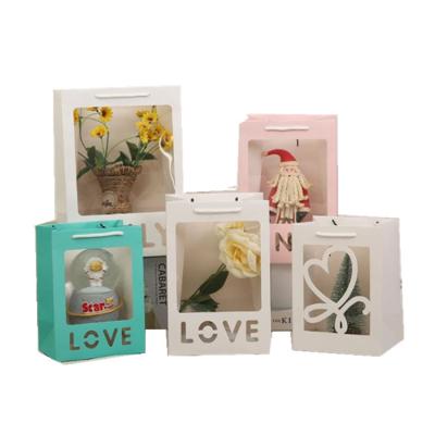 China Wellbeen Recyclable Factory Custom New Creative Paper Bags With Clear Window For Flowers Gift Toys Support Gift Shopping Bags With Window for sale