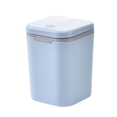 China Sustainable Table small dustbin plastic sale desktop trash can office mini small waste paper basket bedroom bedside pop-up storage bin for sale