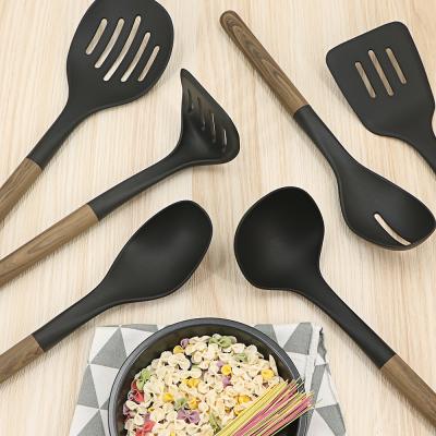 China Sustainable Cookware Set Wooden Handle Nylon Cookware Utensils For Baking for sale