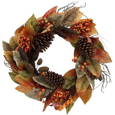 China Indoor and Covered Outdoor Use Faux Magnolia Leaf Pinecones Berry Holiday Wreath Vine for sale