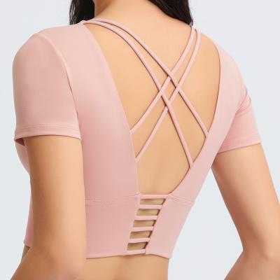 China Women's short sleeve off the shoulder beauty belt backless yoga clothes breathable upper thin cross strap fitness small for sale