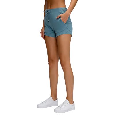 China Breathable High Waist Bandage Sports Loose Shorts Women's Leisure Fitness Yoga Shorts With Pocket for sale