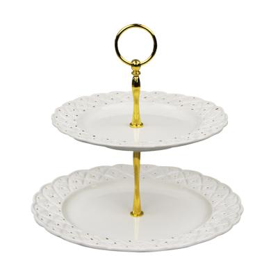 China New trend wedding gift stocked white color with gold dot creative 2 tier ceramic cake dish for sale