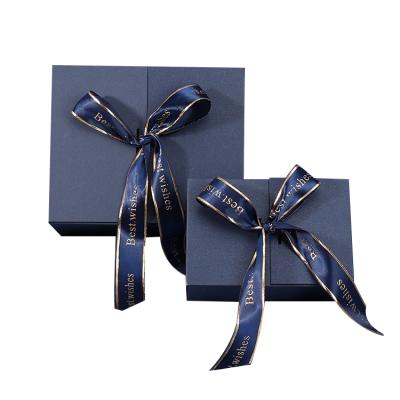 China Biodegradable Hot Sale Holiday Bow Dark Blue Wrapping Square Paper Gift Boxes for sale