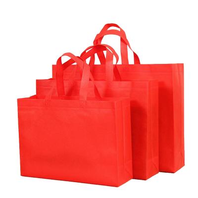 China Eco Friendly Handled PP Spunbond Nonwoven Fabric Bags Degradable Nonwoven Bags For L# Shopping Tote Bags for sale