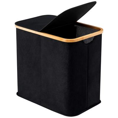 China Contemporary Home Divided Black Bamboo Canvas Double Laundry Hamper With Lid for sale