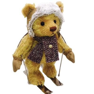 China New Design Plush Brown Bear Toy Sustainable Stuffed Plush Teddy Yellow Ski Bear With Hat Lovely Ski Bear Doll For Kids Play for sale