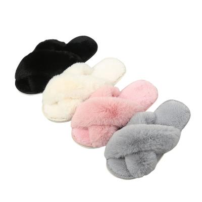 China Cushioning Warm Women Fashion Warm Fluffy Slippers Comfy Faux Fur Cross Indoor Slippers Soft Floor Slips Flat Furry Ladies Slipper for sale