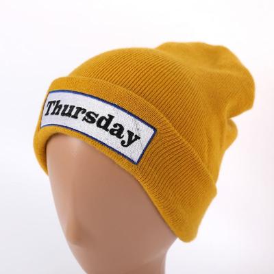 China breathable & Waterproof Logo Knitted Hats Design Your Own Pattern Custom Jacquard Cuffless Beanie for sale