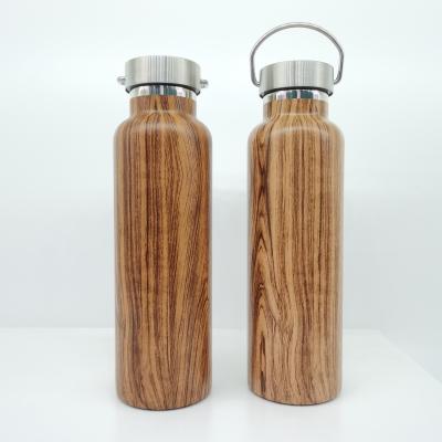 China 2022 Popular Products 600ml Wooden Model 304 Stainless Steel Wall Vacuum Sports Bottle Flask PORTABLE Sport Insulated Double Bottle for sale