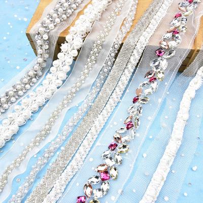 China Crystal Rhinestone Chain Pearl Beaded Decorative Bridal Sew On Mesh Ribbon White Lace Trim for sale