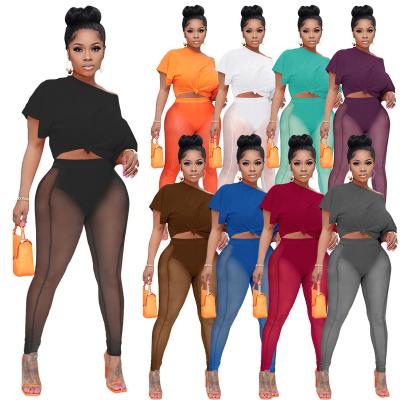 China Solid Breathable And Sexy Summer Sleeve Bandage Crop Tops See Mesh Splice Pants 2 Piece Sets Womens Club Wear for sale