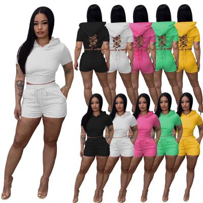 China Breathable Fashion Logo Solid Short Sleeve Hooded Cavity Custom Back Crop Top And Drawstring Shorts Outfits For Women 2 Piece Sets for sale