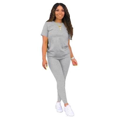 China Custom Logo Short Sleeve Top Slim QUICK DRY pants two piece suits 2022 women solid casual 2 piece outfit fashion jogger sets for ladies for sale