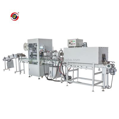 China Automatic sleeve labeling tape packing machine for sale